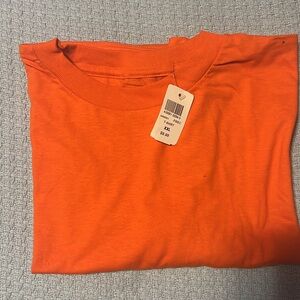 Two brand new Men’s Footlocker T-Shirts Orange and Red size XXL
